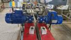 Etiquetadora automtica de doble cabezal para botellas planas Bauch Campos