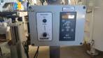 Etiquetadora automtica autoadhesiva para botellas cilndricas