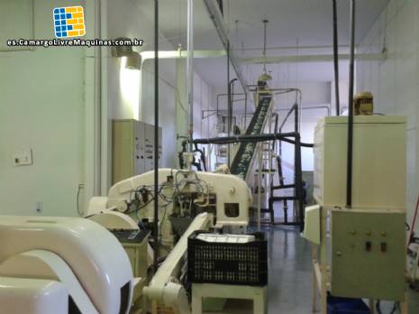 Dep�sito de refrigerante Jones y prensa