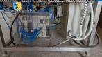 M�quina rotativa de acero inoxidable para llenado, dosificaci�n y sellado, con junta de aluminio, para tarros, vasos y botellas Delgo.
