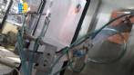 Llenado lineal con taponadora Dmom