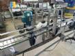 Elevador de posicionamiento y llenado de tapas para la industria de maquinaria SLP