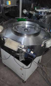 Alimentador rotativo de balas y goma de mascar tipo m�quinas Flow Pack