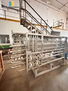 Pasteurizador tubular en espiral de acero inoxidable FAMONTE, de 3.500 litros por hora, para pulpas de frutas, jugos, l�cteos y derivados.
